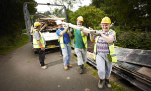 Volunteers collecting wood