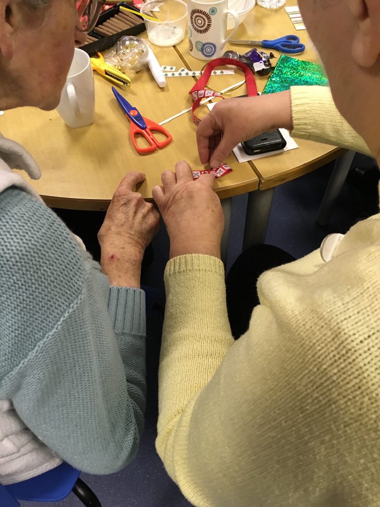 Helping with crafts