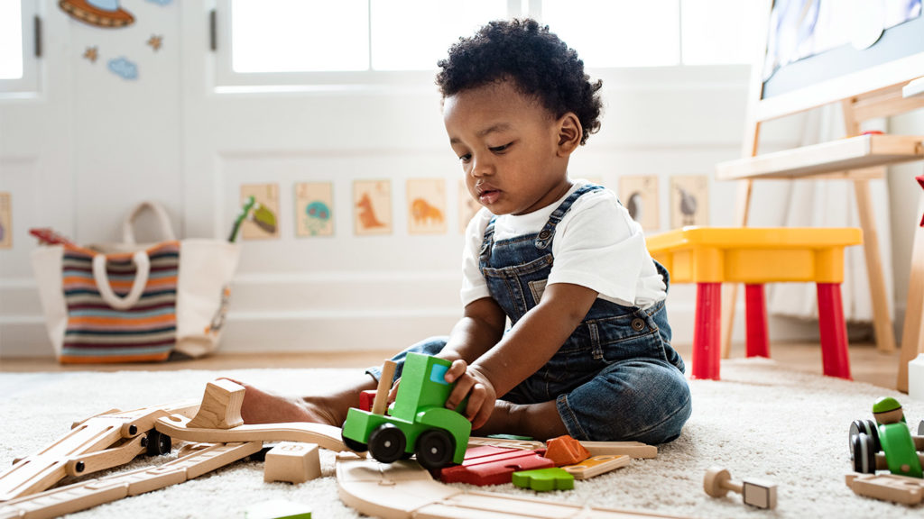 child playing in nursery