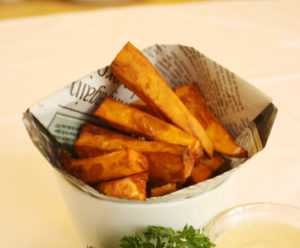 Sweet potato fries are excellent served with vegan tofu fish sticks