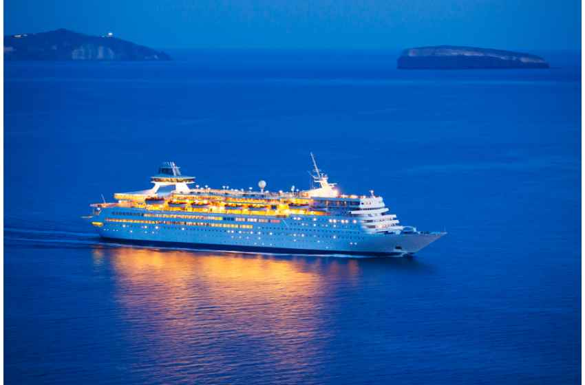 Cruise ships on the ocean - blue seas and bright lights